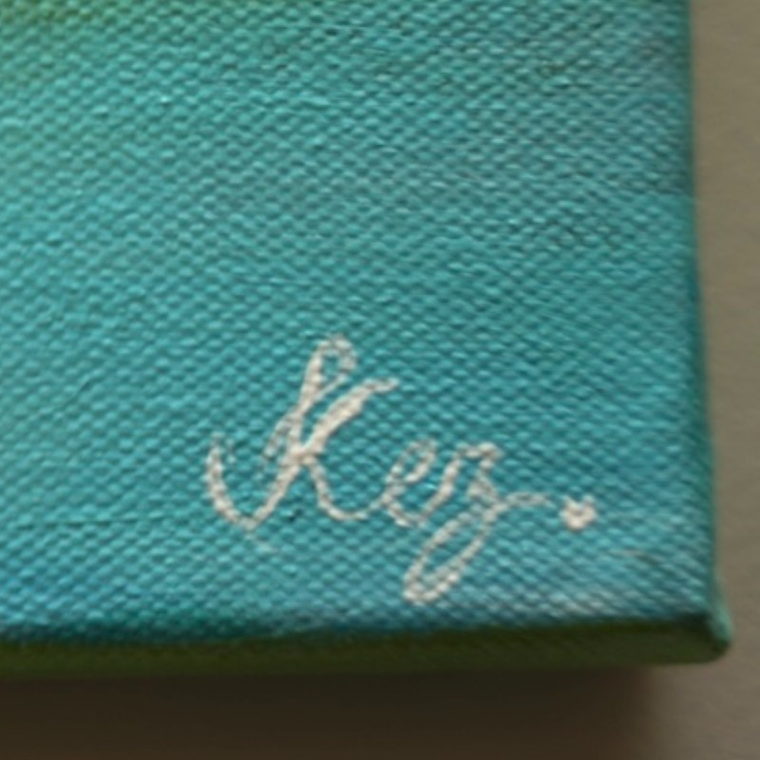 Hand-painted Kez signature on the canvas